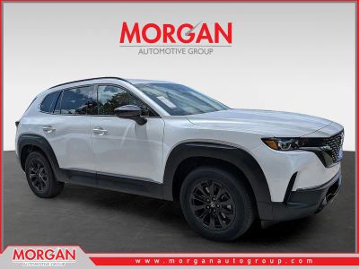 2026 Mazda CX-50 Hybrid Premium in Beige — front three-quarter view