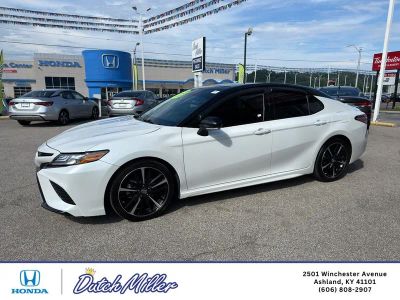 2019 Toyota Camry — rear three-quarter view
