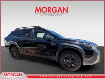 2022 Subaru Outback Wilderness in Crystal Black Silica — front three-quarter view