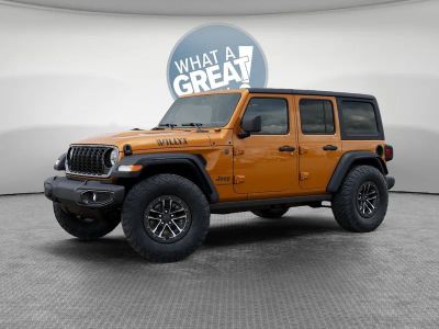 2026 Jeep Wrangler — rear three-quarter view
