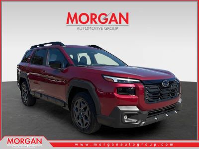 2026 Subaru Outback Premium in Crimson Red Pearl — front three-quarter view