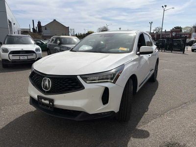 2023 Acura RDX w/A-Spec Advance Package in Platinum White Pearl — front three-quarter view