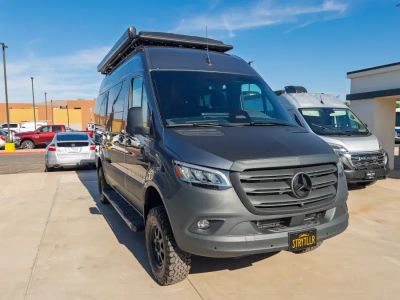 2026 Storyteller Overland DARK MODE — front three-quarter view