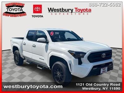 2025 Toyota Tacoma SR5 in Ice — front three-quarter view