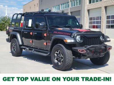 2023 Jeep Gladiator Rubicon in Black Clearcoat — front three-quarter view