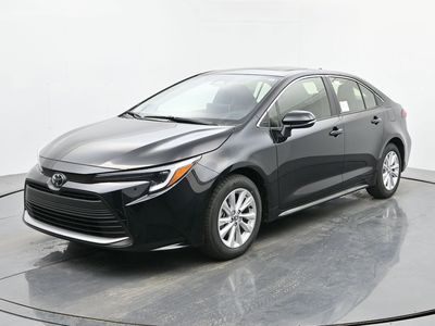 2026 Toyota Corolla Hybrid XLE in Midnight Black Metallic — front three-quarter view