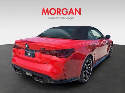 2026 BMW M4 — rear three-quarter view