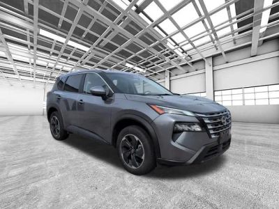 2024 Nissan Rogue SV in Gray — front three-quarter view