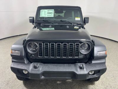 2026 Jeep Wrangler — rear three-quarter view