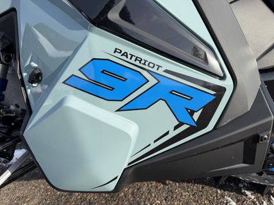 2026 Polaris Patriot 9R PRO RMK 165 SC S26TGM9BS in Hemlock Blue / Black / Velocity Blue — front three-quarter view