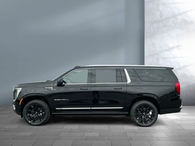 2026 GMC Yukon XL — rear three-quarter view