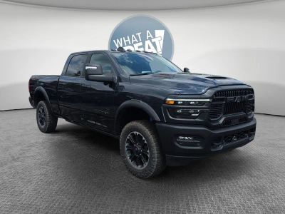 2026 RAM 2500 Rebel in Forged Blue Metallic — front three-quarter view
