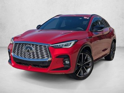 2024 INFINITI QX55 ESSENTIAL in Dynamic Sunstone Red — front three-quarter view