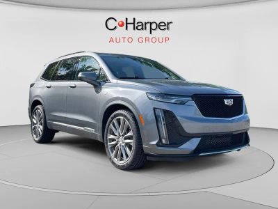 2021 Cadillac XT6 Sport in Satin Steel Metallic — front three-quarter view