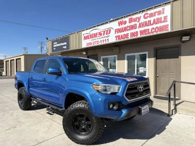2017 Toyota Tacoma Double Cab in Blue — front three-quarter view