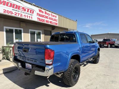 2017 Toyota Tacoma Double Cab — rear three-quarter view