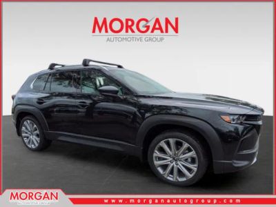 2026 Mazda CX-50 2.5 Turbo Premium Plus in Jet Black Mica — front three-quarter view