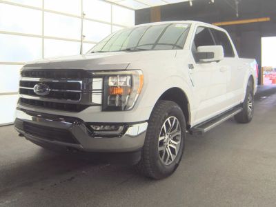 2022 Ford F-150 Lariat in White — front three-quarter view