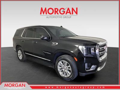 2021 GMC Yukon SLT in Black — front three-quarter view