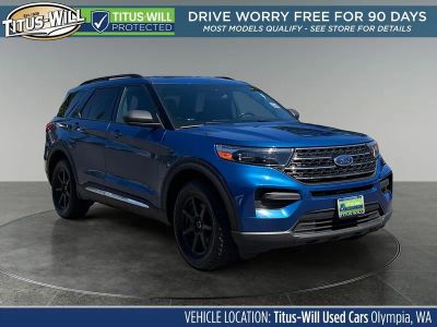 2020 Ford Explorer XLT in Blue Metallic — front three-quarter view