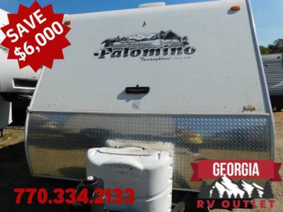 2011 Palomino Thoroughbred Travel Trailers T-291 — front three-quarter view