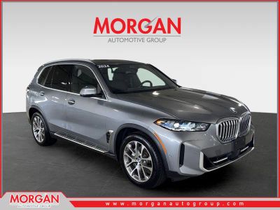 2024 BMW X5 xDrive40i in Gray — front three-quarter view