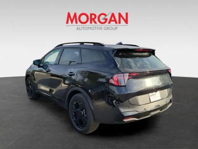 2026 Kia Sportage Plug-In Hybrid — rear three-quarter view