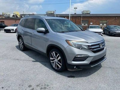 2017 Honda Pilot — rear three-quarter view