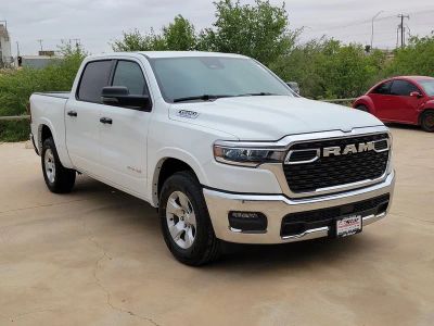 2026 RAM 1500 Big Horn/Lone Star in Bright White Clearcoat — front three-quarter view