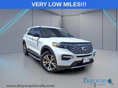 2020 Ford Explorer Platinum in White Metallic — front three-quarter view