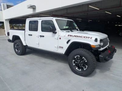 2026 Jeep Gladiator Rubicon X in Bright White Clear-Coat Exterior Paint — front three-quarter view