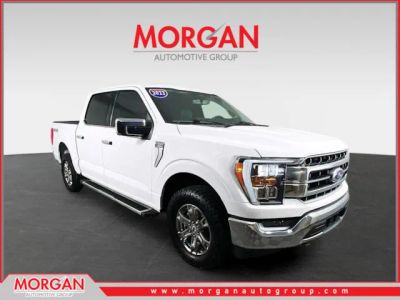 2023 Ford F-150 Lariat in White — front three-quarter view