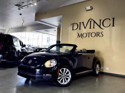 2014 Volkswagen Beetle Convertible in Black — front three-quarter view
