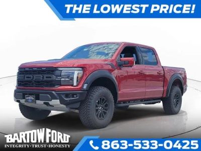 2026 Ford F-150 Raptor in Ruby Red Metallic — front three-quarter view