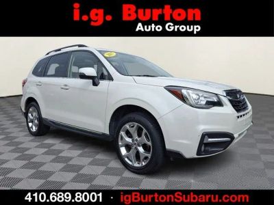2017 Subaru Forester 2.5i Touring in Crystal White Pearl — front three-quarter view