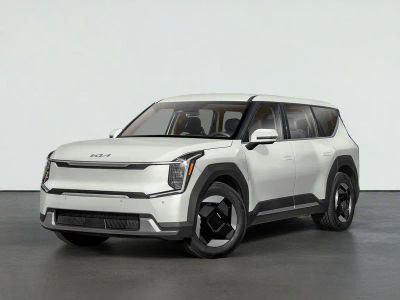 2024 Kia EV9 LAND in Ivory Silver — front three-quarter view