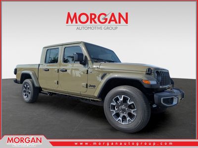 2026 Jeep Gladiator Sahara in Green — front three-quarter view