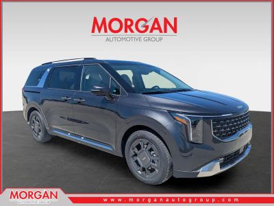 2026 Kia Carnival SX in Panthera Metal — front three-quarter view