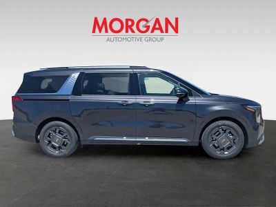 2026 Kia Carnival — rear three-quarter view