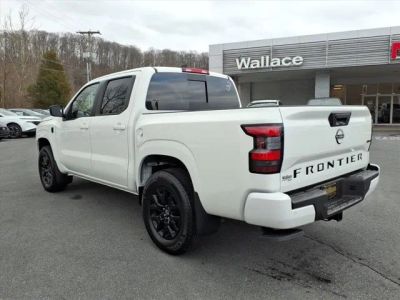 2026 Nissan Frontier — rear three-quarter view