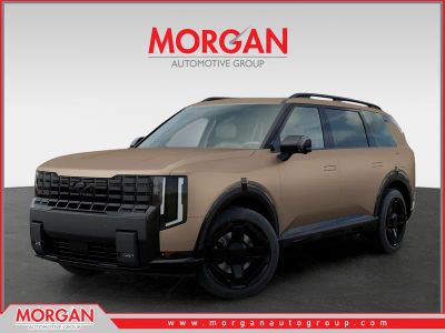 2027 Kia Telluride X-Line SX-Prestige in Terrain Brown Matte — front three-quarter view