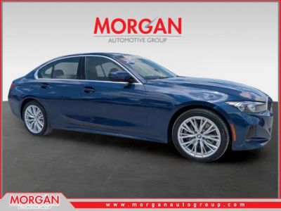 2023 BMW 3 Series 330i in Phytonic Blue Metallic — front three-quarter view