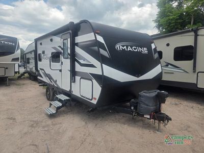 2022 Grand Design Imagine XLS in White fiberglass with graphics — front three-quarter view