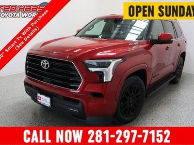 2025 Toyota Sequoia 4WD SR5 3.4T/Electric in Supersonic Red — front three-quarter view