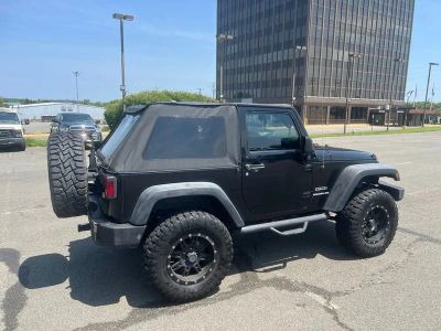2017 Jeep Wrangler — rear three-quarter view
