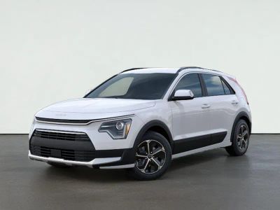 2026 Kia NIRO EX in Snow White Pearl — front three-quarter view