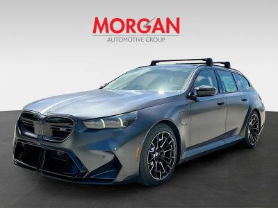 2026 BMW M5 — rear three-quarter view