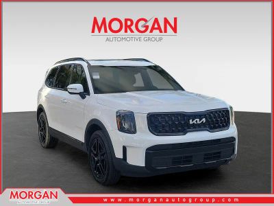 2024 Kia Telluride EX X-Line in Glacial White Pearl — front three-quarter view