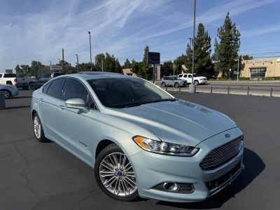 2014 Ford Fusion in Blue — front three-quarter view