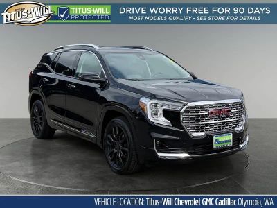 2024 GMC Terrain Denali in Ebony Twilight Metallic — front three-quarter view